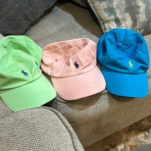Three polo Ralph Lauren baseball caps. One new with tags. Other two like new.